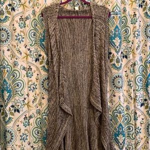 Black and white sleeveless sweater